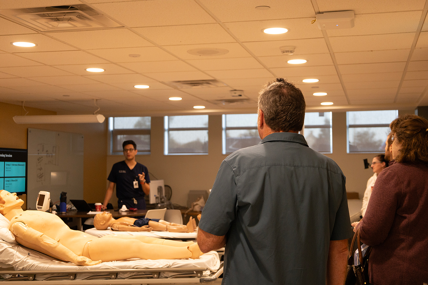 Dr. Shawn Segeren provides a brief itinerary to participants in the Dynamic Simulation Procedural Skills Day, comprised of other local ED Physicians.